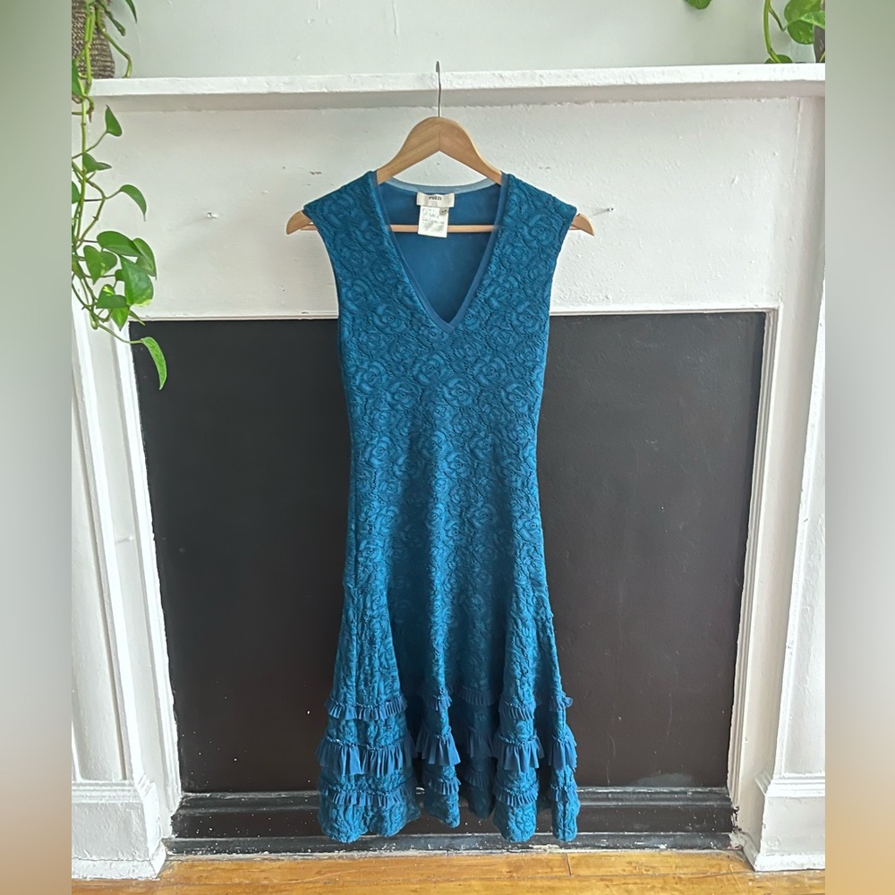 Fuzzi sleeveless teal floral lace dress with ruffled flair